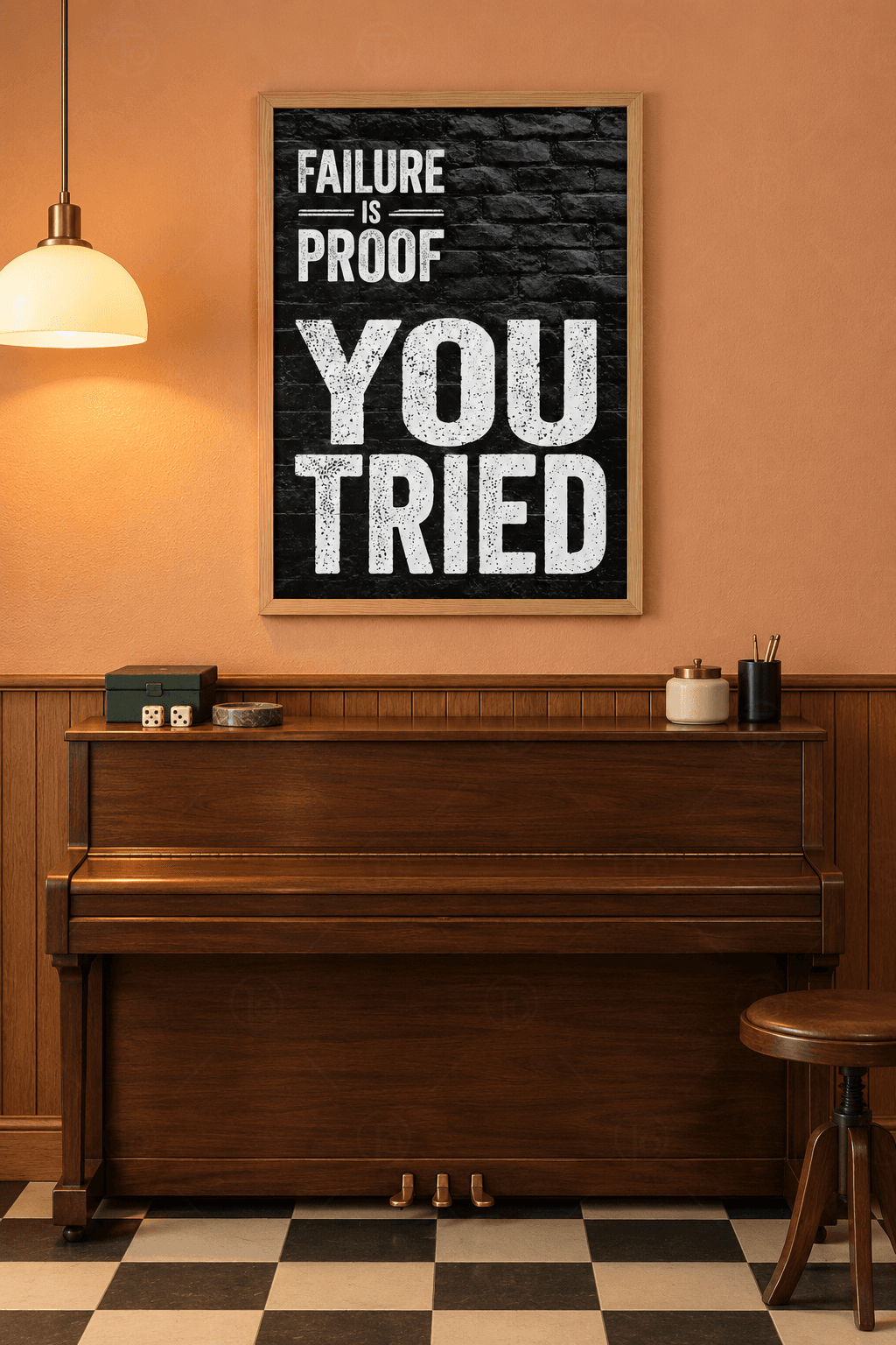 Ahşap çerçeveli motivasyon tablosu — siyah tuğla duvarda beyaz harflerle Failure Is Proof You Tried yazısı